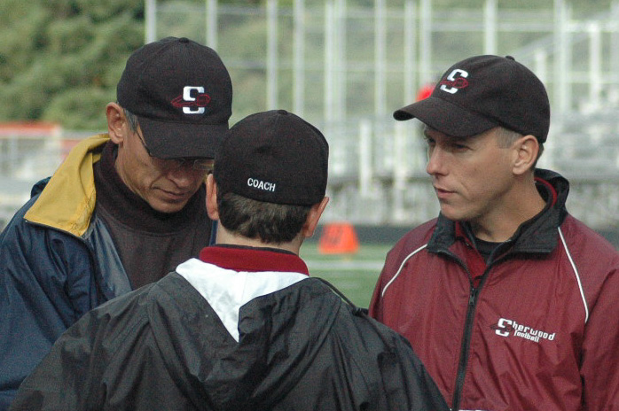 Chris with other coaches in 2007